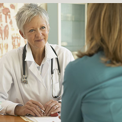 Heading into perimenopause older female doctor