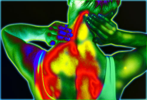 What Is Fibromyalgia woman holding neck
