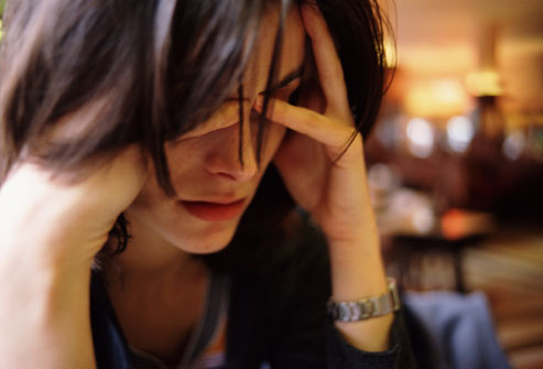 Fibromyalgia and Fatigue woman with headache